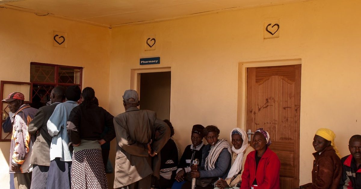 Patients waiting in a clinic waiting room in East Africa