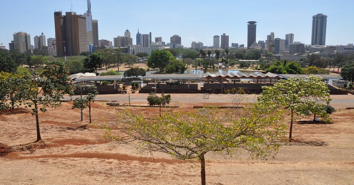 Nairobi city skyline seen across open ground